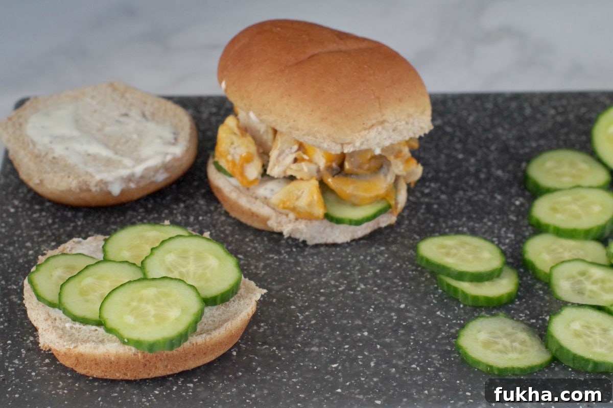 Juicy Grilled Chicken Breast Burger Recipe 7 cucumbers on bun with ranch dressing