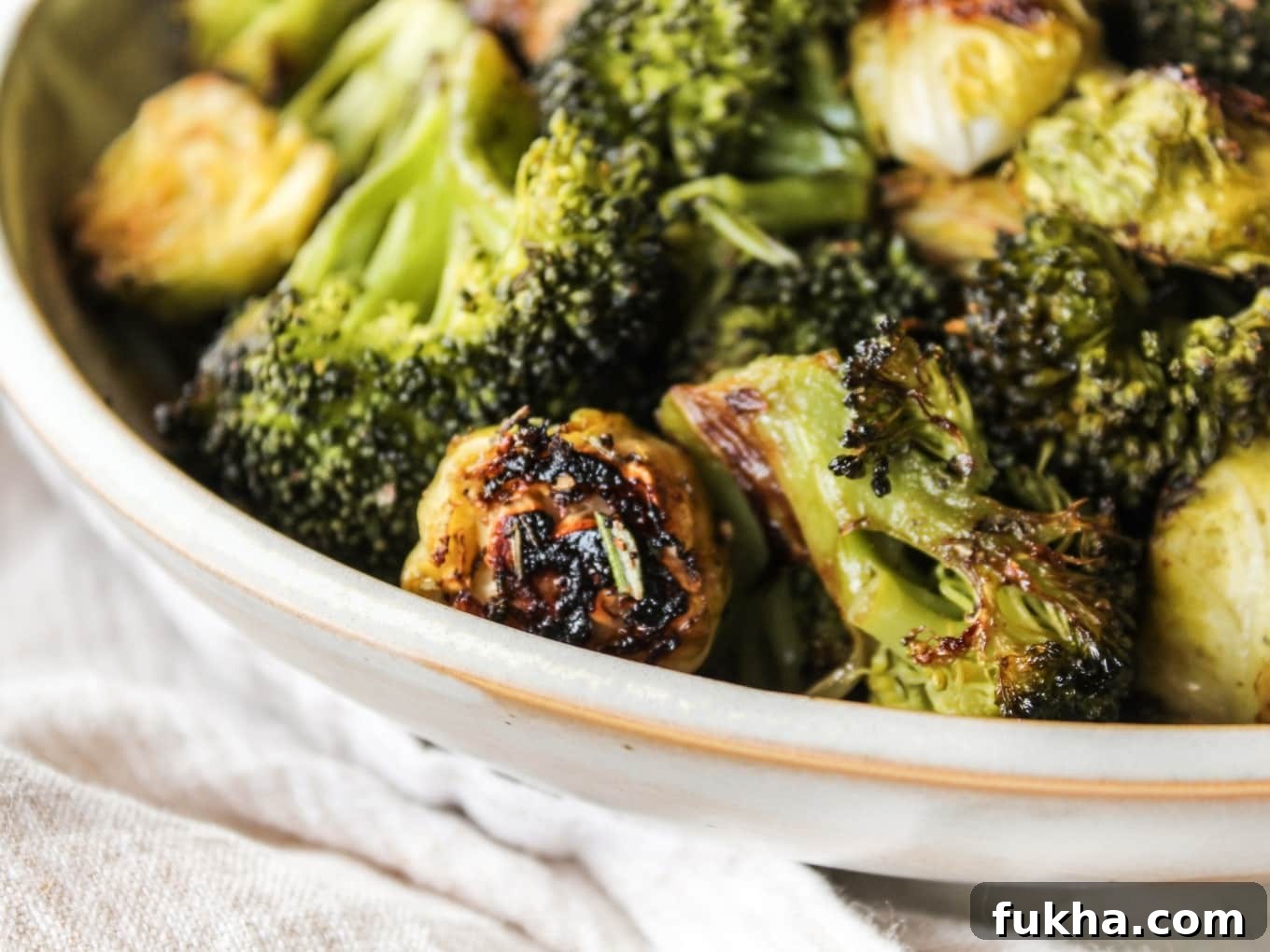 Crispy Herb-Roasted Brussels Sprouts and Broccoli 3 Close-up of roasted brussels sprouts and broccoli