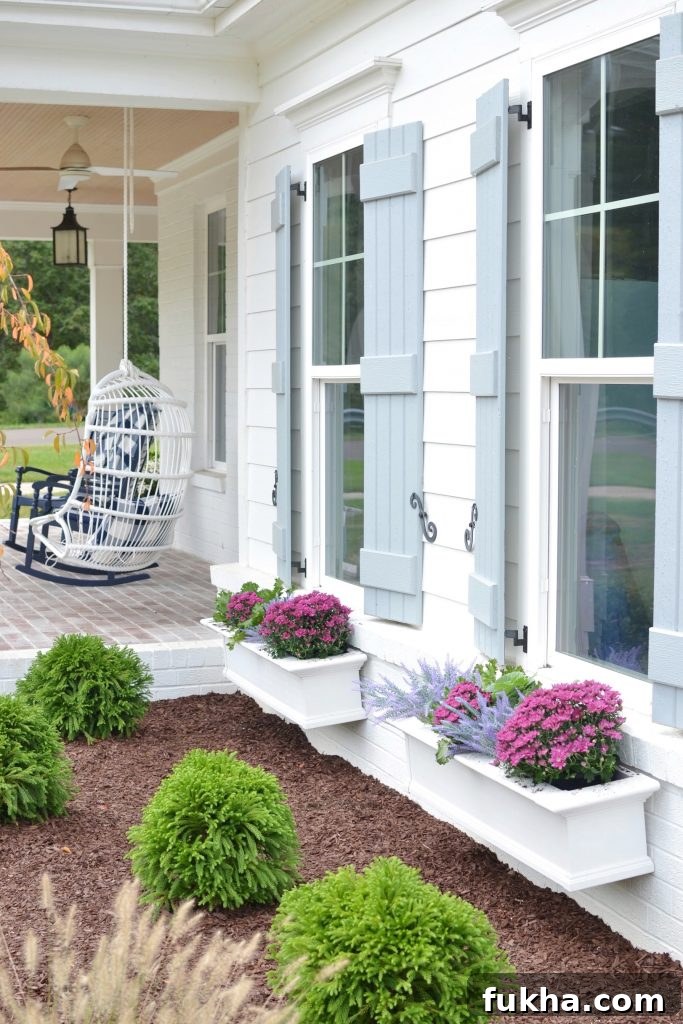 a mix of Artificial Window Box Flowers  and real