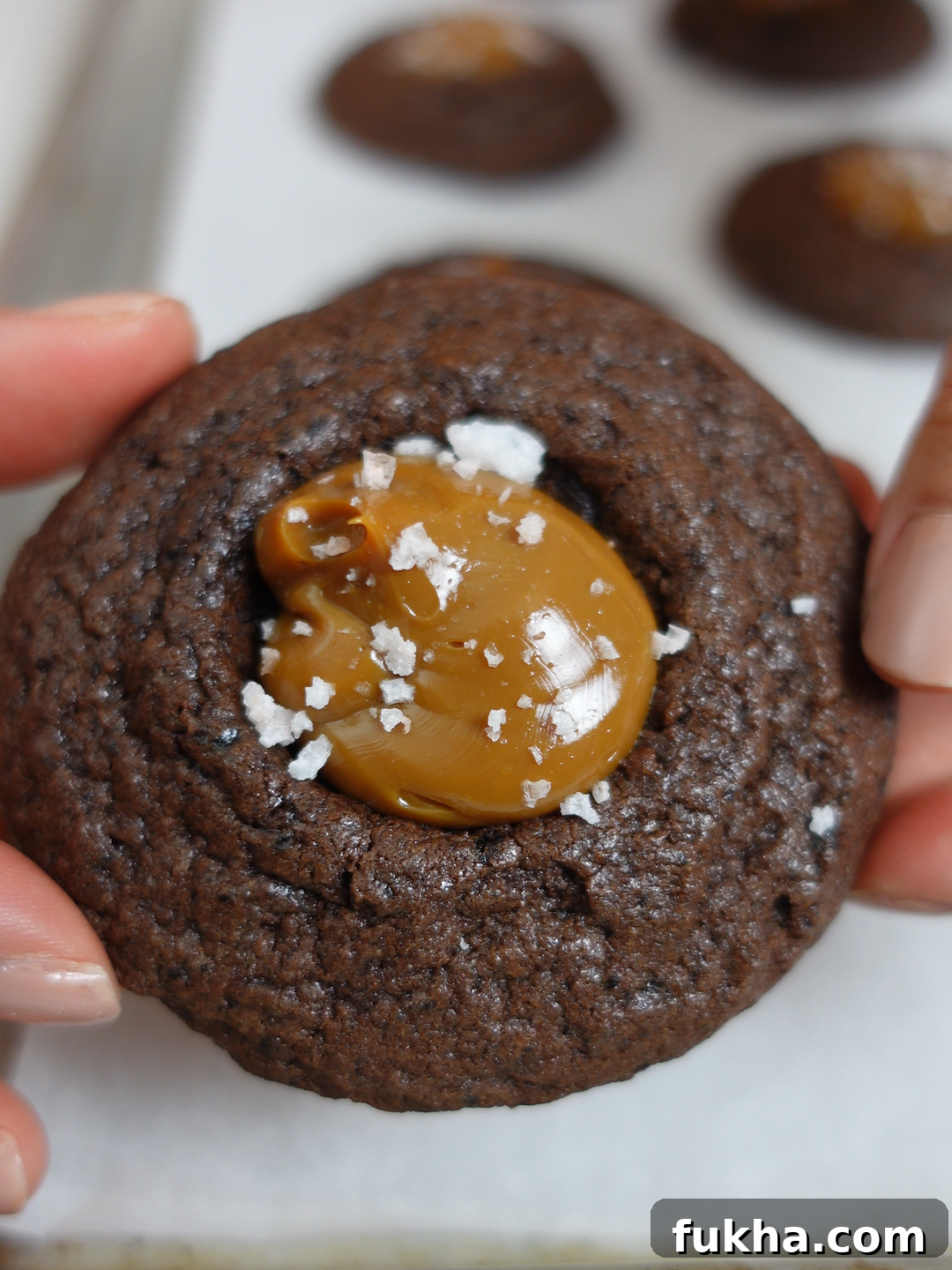 Salted Chocolate Dulce de Leche Cookies for Cookiemas Day 8 2 Salted chocolate dulce de leche cookies on a baking tray