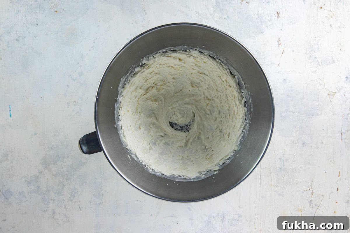 Butter and monk fruit sweetener in mixing bowl.