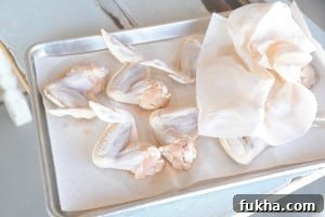 Pat wings dry with paper towels