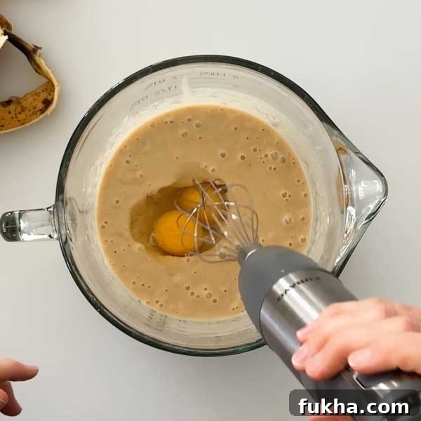 Fudgy Gluten Free Double Chocolate Zucchini Banana Muffins 8 Juiced and zested orange on a kitchen counter.