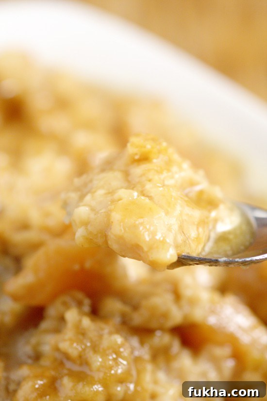 Overnight Crockpot Apple Oatmeal recipe with tangy apples, nutty oats, and sweet butter and powdered sugar glaze is a perfect overnight make ahead breakfast recipe for Fall and the holidays.