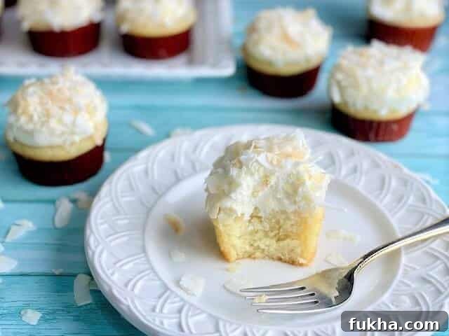 Partially Eaten Coconut Cream Cupcake