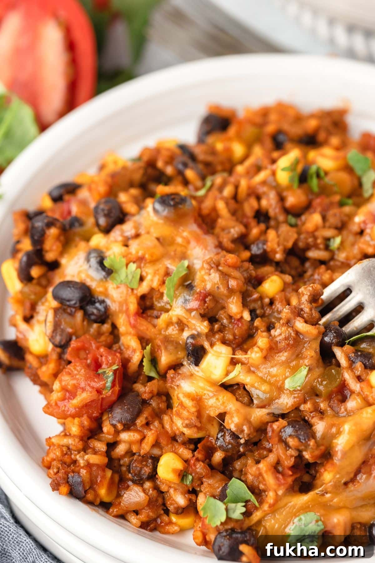 Mexican rice skillet with a fork.