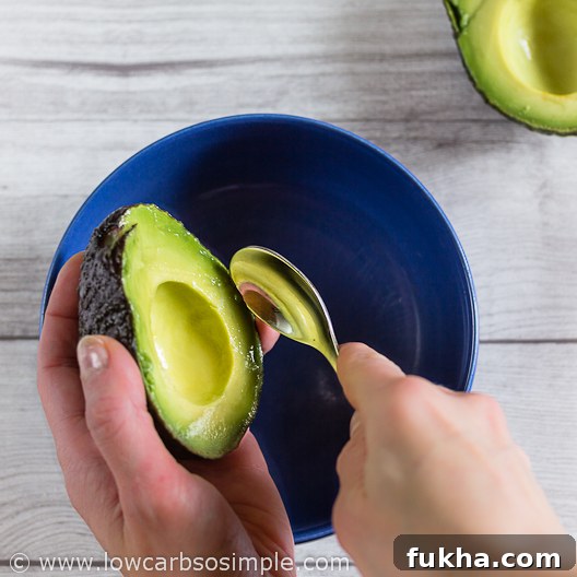 1-Ingredient Zero-Carb Chips with Spicy Cajun Avocado Mayo 7 Spicy Cajun Avocado Mayo; Scooping the Flesh | Low-Carb, So Simple