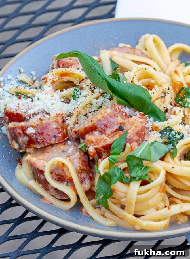 Grilled Italian Sausage Pasta 2 gray plate of grilled salsiccia pasta
