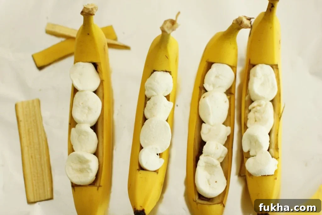 Campfire Banana Boat Recipe for Kids 13 Banana Boats filled and ready to wrap