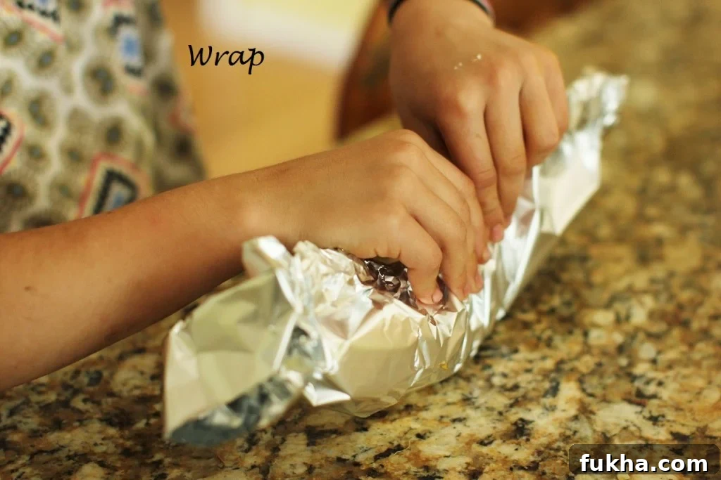 Campfire Banana Boat Recipe for Kids 10 Wrap up the Banana Boats with foil