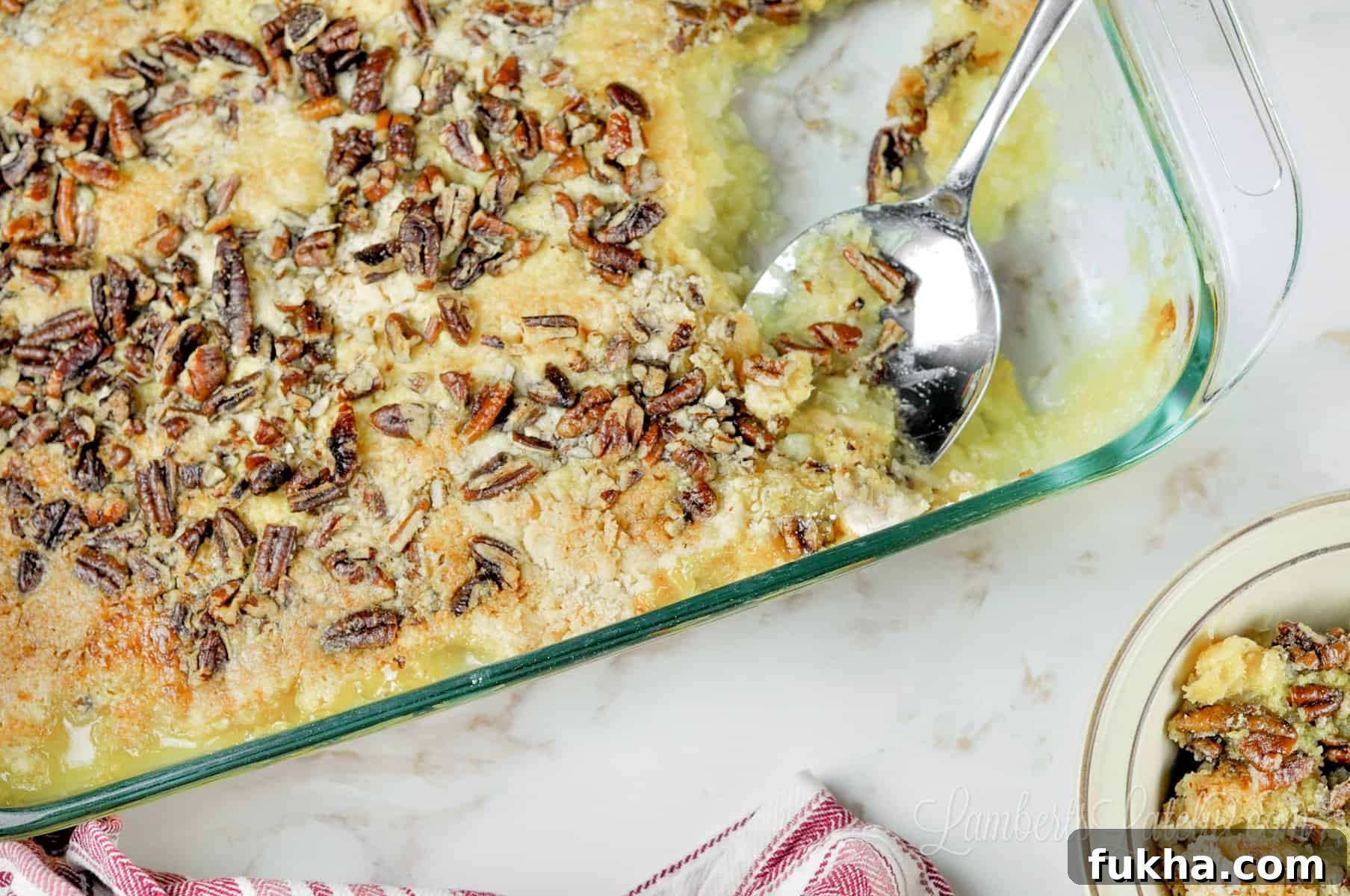 glass baking dish of pineapple dump cake.