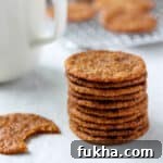 A close up of a stack of Swedish Ginger Cookies (Pepparkakor).