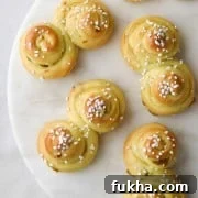 St. Lucia Buns on a marble plate.