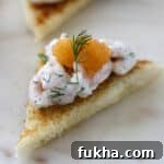Close up of Toast Skagen topped with caviar.