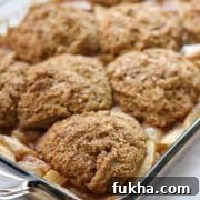 Gingerbread cobbler with apples and pears in a baking dish