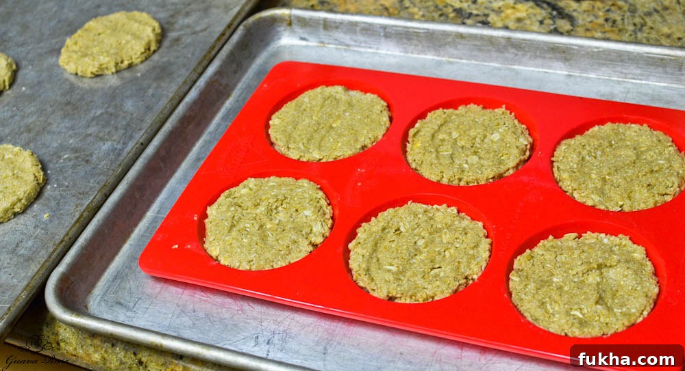 Oatcake dough in muffin top pan