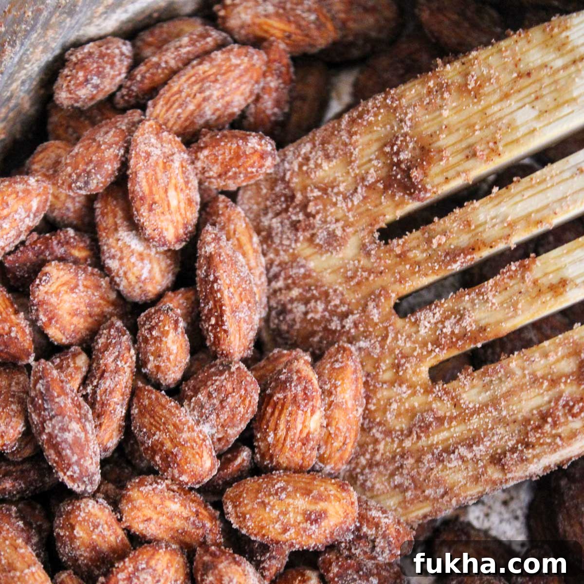 Candying the cinnamon almonds on medium heat.