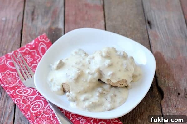 4 Practical Steps When You Can't Make Ends Meet 4 Photo shows a plate of biscuits and gravy on a table with a red napkin